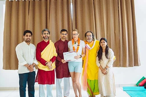 Anastasiya Kozyryeva, student of Nirvana Yoga School receiving her 300 hour Yoga Teacher Training certification	